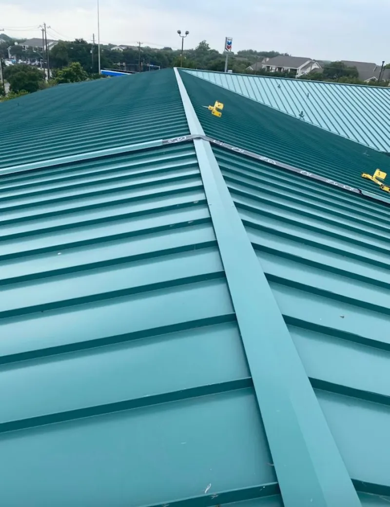 Green commercial metal roof ridge and valley for Metal Roof Repair in Orosi